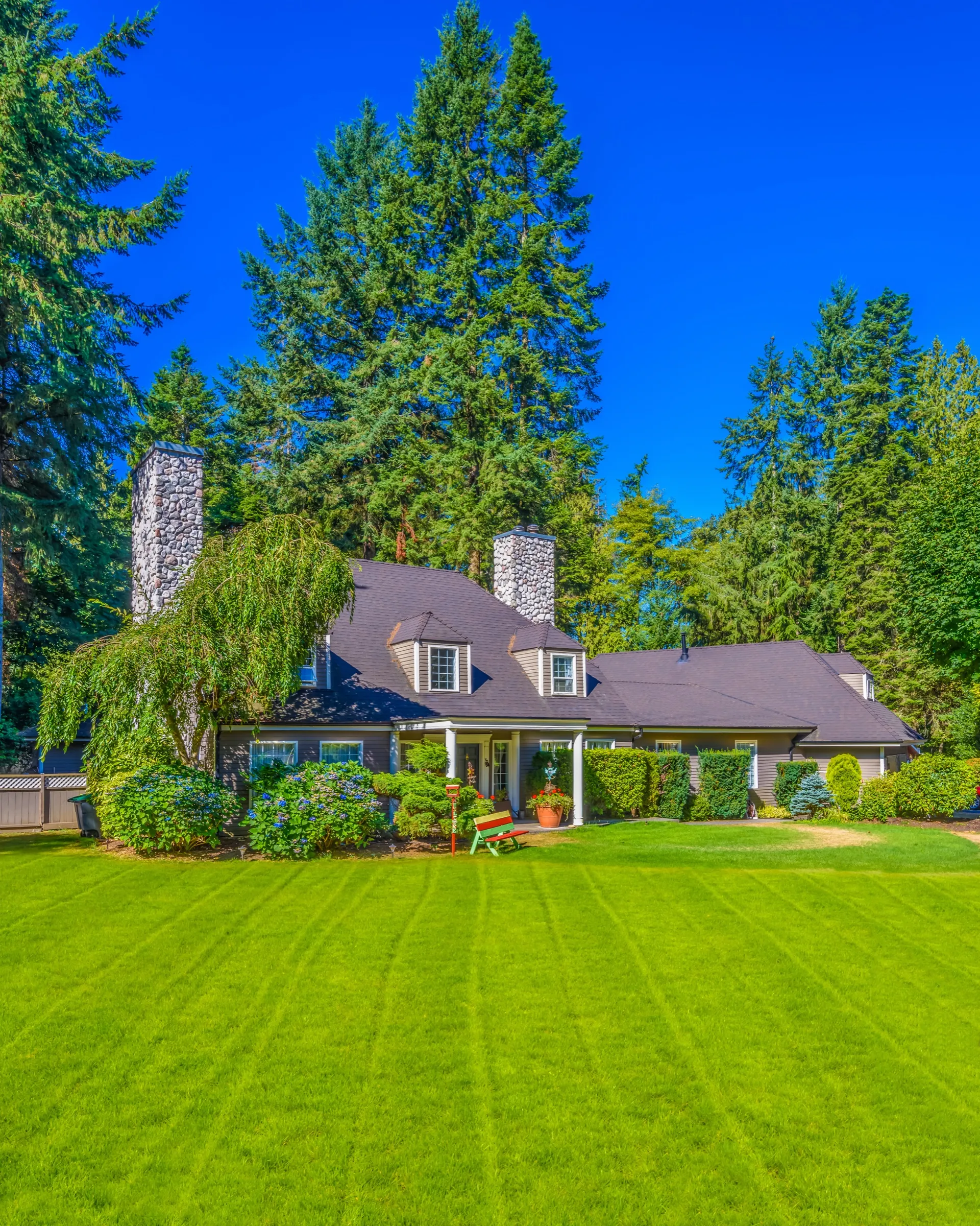 House with a freshly striped front lawn